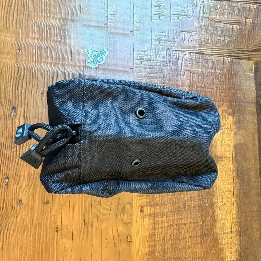 Black canvas pouch with drawstring and grommets for Tactical Molle Bag functionality