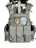 Tactical olive drab body armor with pouches and patches from Redemption Tactical Level IIIA
