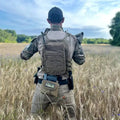 Tactical vest in Ranger Green with empty pouch, worn in field for SOB IFAK product