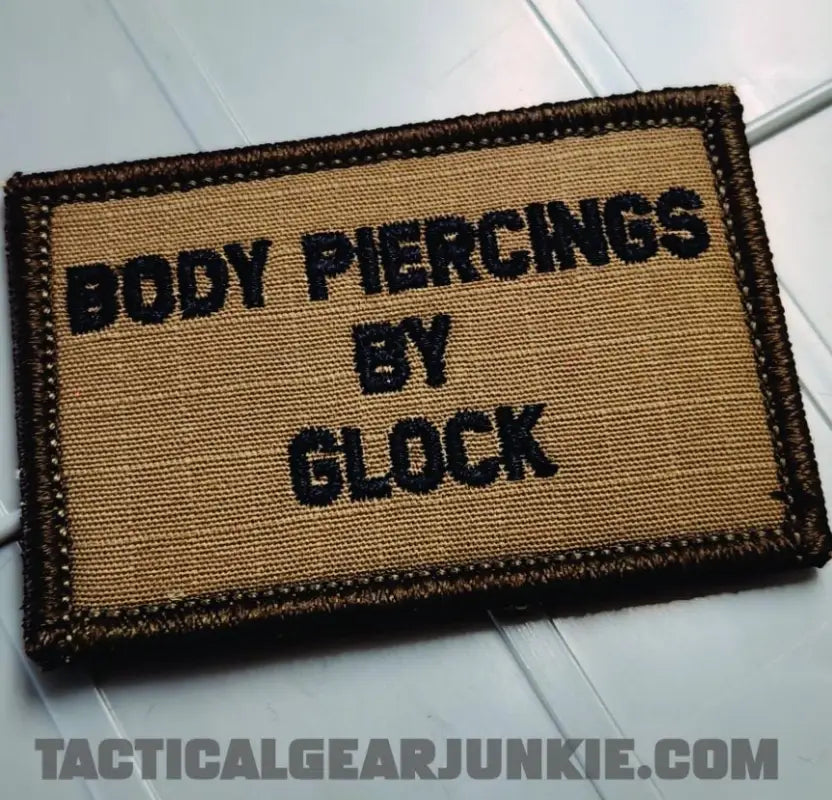 Tan and black 2x3 Glock patch with embroidered text Body Piercings By Glock