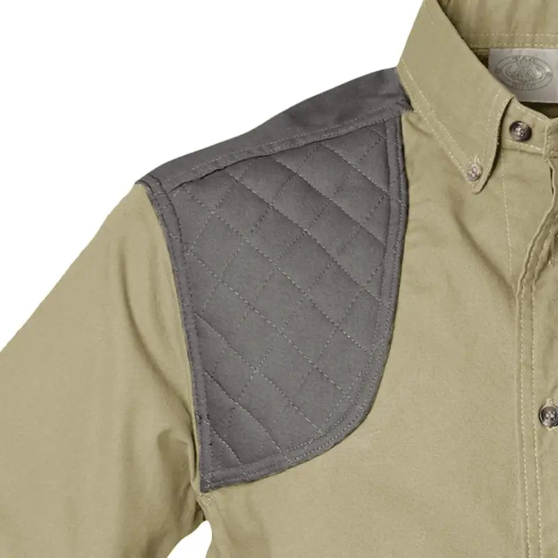 Tan shooting shirt featuring quilted gray shoulder patch for upland enthusiasts