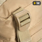 Tan plastic buckle with nylon webbing strap on M-Tac Assault Pack for secure storage