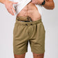 Carrier Shorts Mk.II with concealed carry gun tucked in waistband, arrowhead tactical apparel