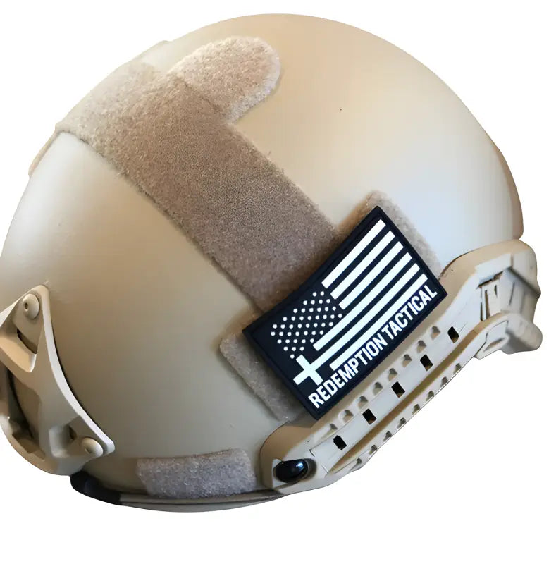 Tan RT2 Ballistic High Cut Helmet with American flag patch and rail system from Redemption Tactical