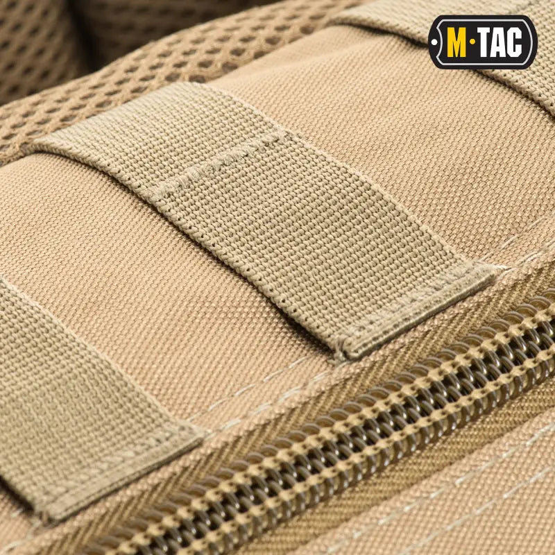 Tan tactical pouch with MOLLE webbing for M-Tac Assault Pack’s large main zippered compartments