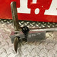 Metal clamp with black knob on The Billy G.O.A.T. Wedge 7075 aluminum forcible entry