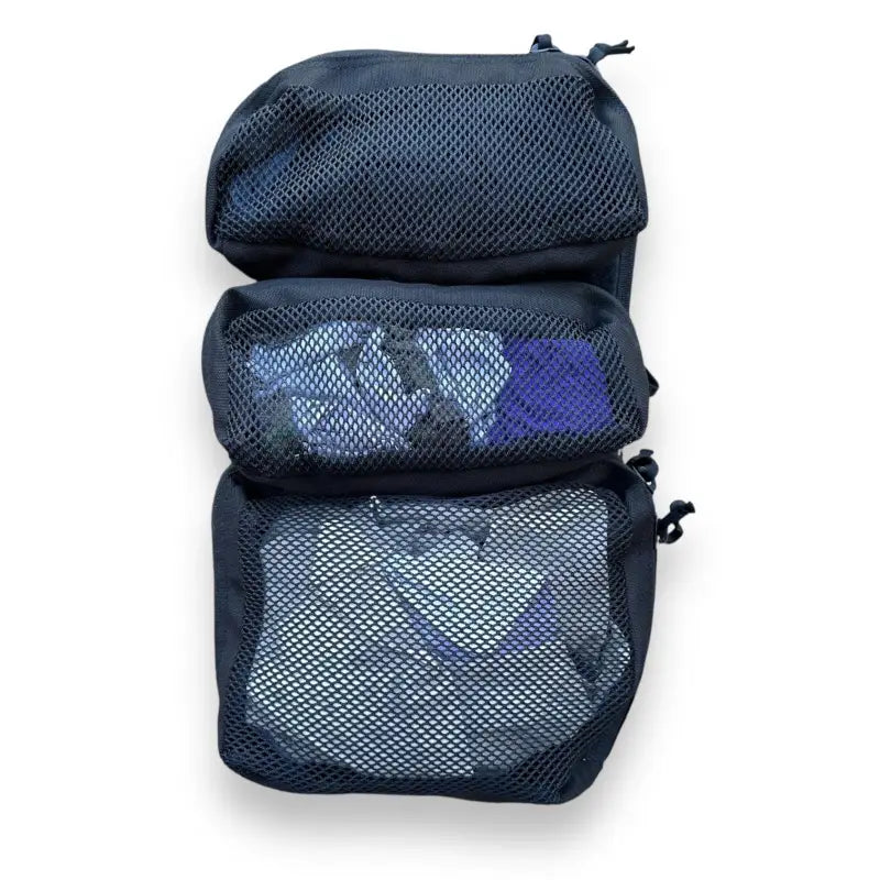 Three black mesh packing cubes in a 12HR Plus Royal Blue Backpack with Interior Slash Pocket