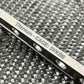 Titanium cage bar with engraved text on textured surface for Adjustable Wrench - Titanium