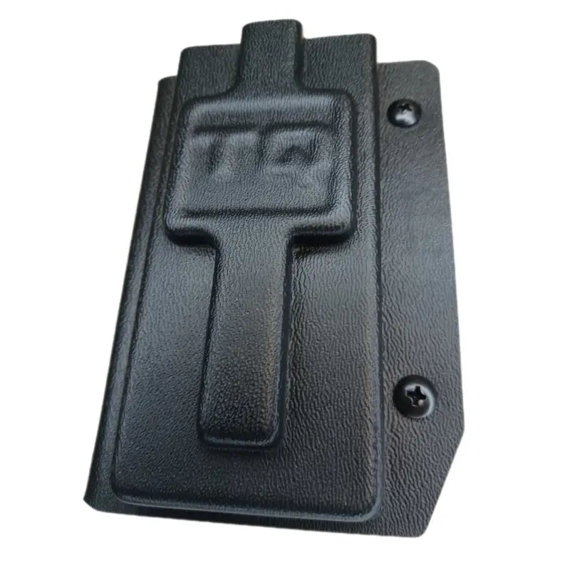 Black plastic tourniquet holder with FTC branding for first responders in coyote brown