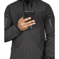 Hand holding a black smartphone in protective case by Tradecraft Tactical Jacket 2.0