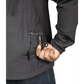 Hand accessing zippered pocket on Tradecraft Tactical Jacket for level IIIA body armor