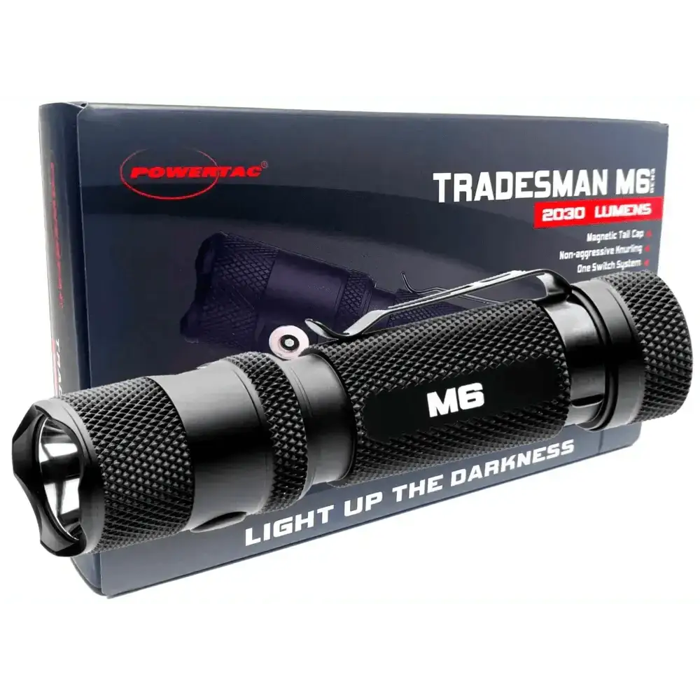 Black tactical flashlight featuring Tradesman M6 branding and magnetic tail cap design