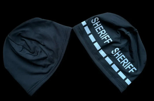 Reversible black sheriff beanies for police and first responders featuring firefighter style