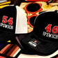 Two black and white mesh baseball caps with Ipswich and first responders numbers embroidered