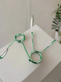 Two green spring clamps from SFE 2’’ Spring Collars, essential for first responders