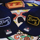 Two navy blue baseball caps with Engine 3 patches in square passport cursive design