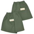 Two olive green elastic waist shorts with beige label patches for canvas ankle gaiters