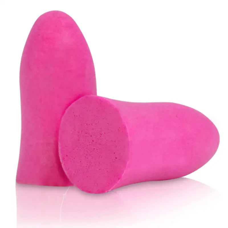 Two pink 31dB NRR bell-shaped soft foam earplugs for sound reduction comfort