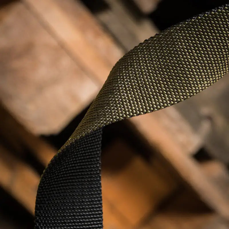 Two overlapping woven nylon straps in black and olive green for M-Tac Double Sided Lite Tactical Belt