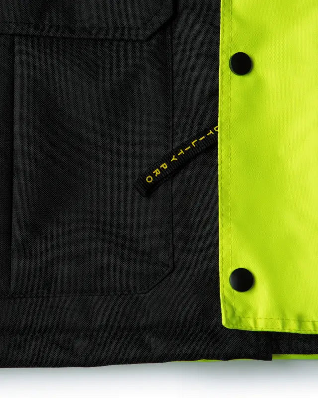 Black and neon yellow UHV1004 HiVis Contractor Jacket with snap buttons from Utility Pro