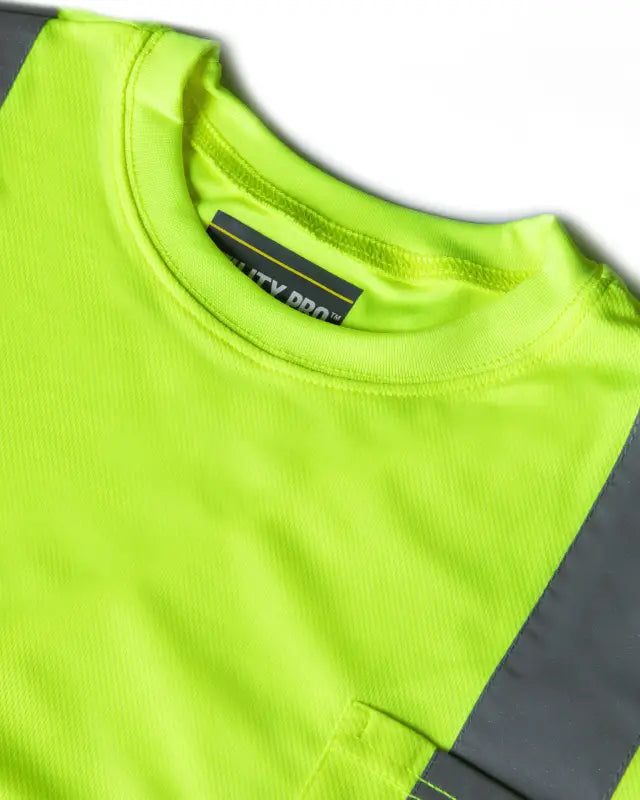 Neon yellow UHV403 HiVis Long Sleeve Tek Tee with black label tag for visibility