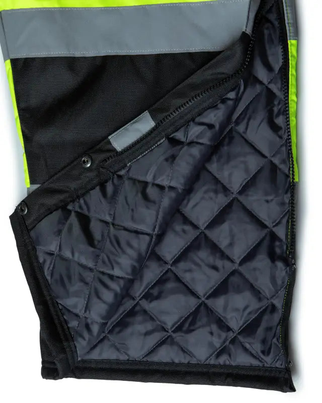 Quilted black fabric panel with zipper on UHV500 HiVis Lined Bib Overalls