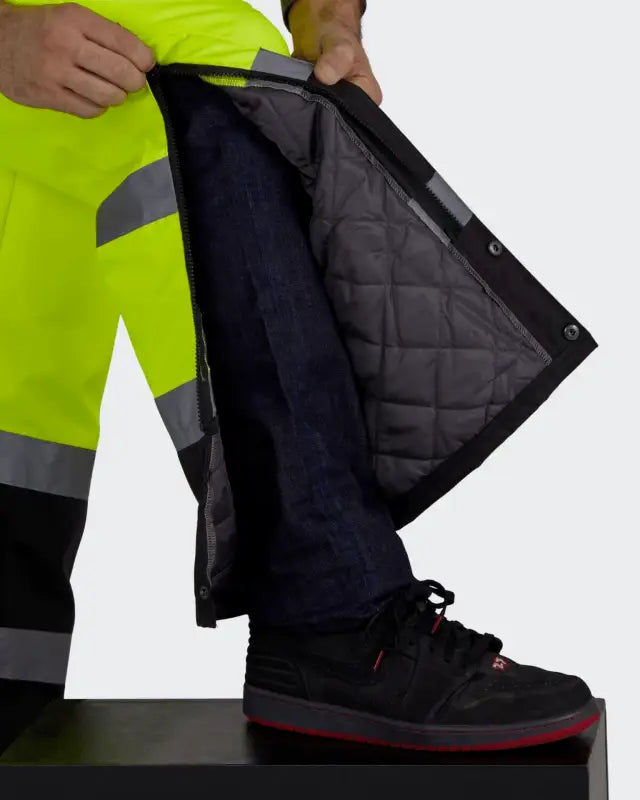 Quilted black UHV500 HiVis Lined Bib Overalls with reflective safety stripes for winter work