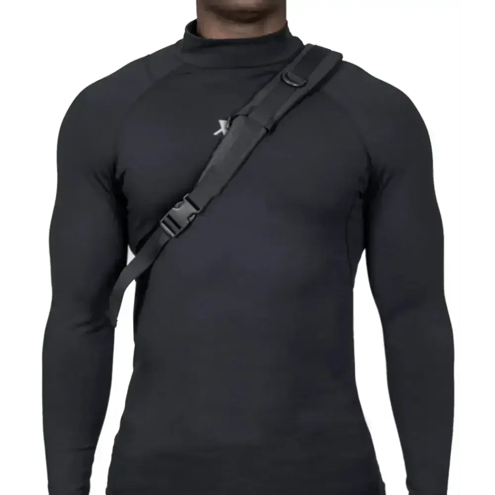 Black compression shirt with diagonal shoulder strap for Ultimate Assault Backpack use