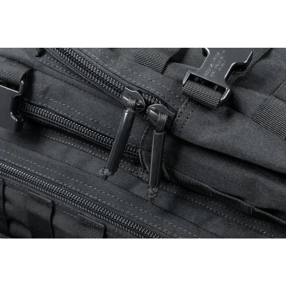 Black tactical zipper with pull tabs on the Ultimate Assault Backpack featuring MOLLE webbing