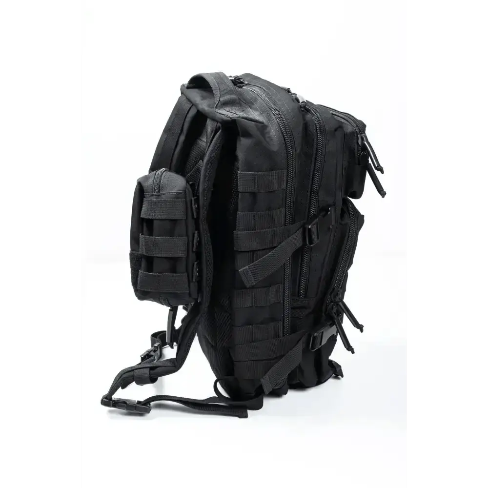 Black tactical military-style Ultimate Assault Backpack with MOLLE webbing and compartments