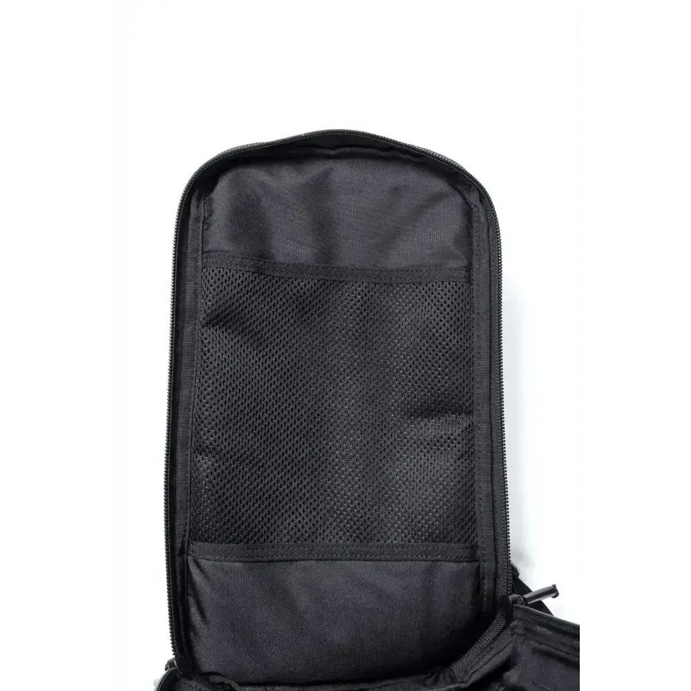 Black mesh pocket compartment inside Ultimate Assault Backpack for organized storage