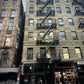 Urban building with fire escape and firefighting equipment for personal carry and fireground applications