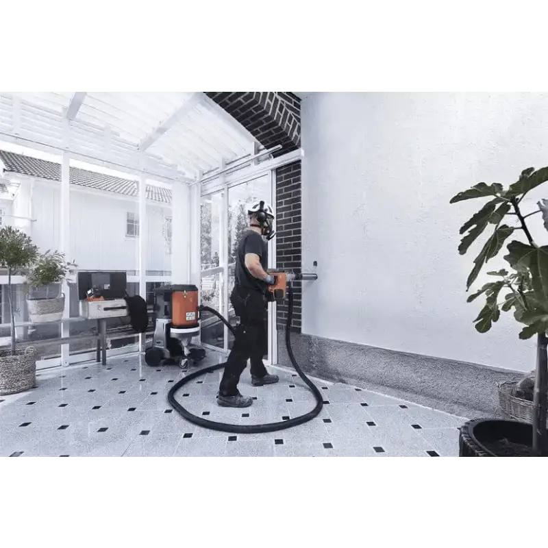 Virtual reality user on circular platform with Husqvarna 540i battery powered core drill kit