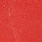 Water droplets on red surface highlighting Firefighter XXL Turnout Gear Bag design