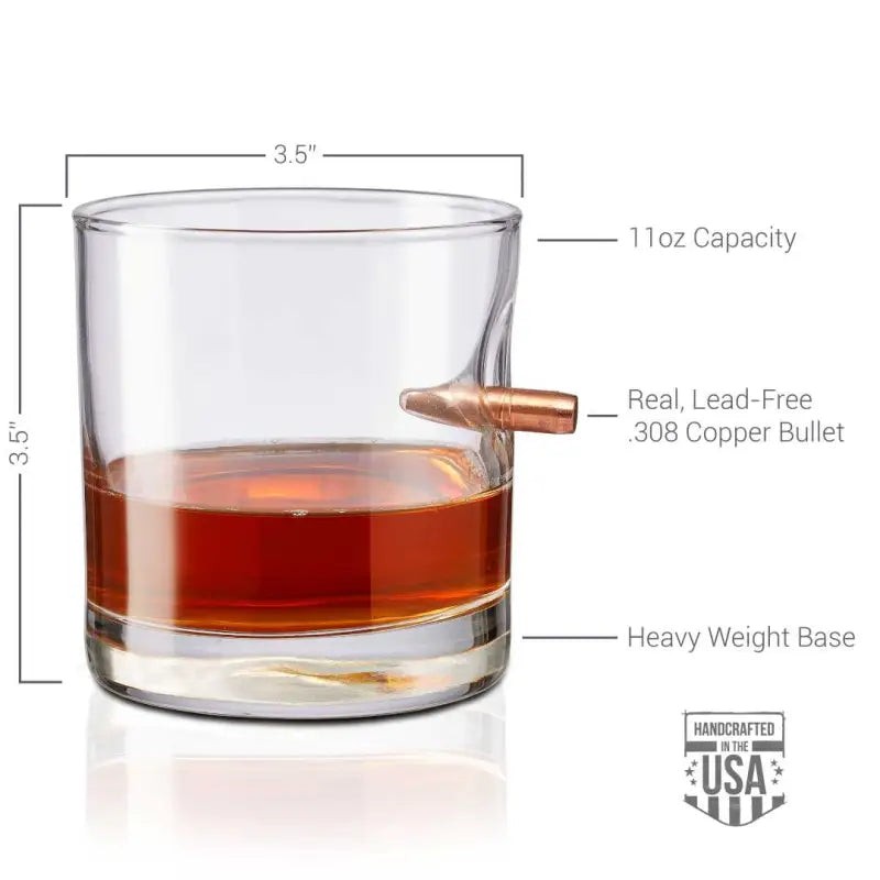 Whiskey rocks glass featuring embedded copper bullet design in BenShot Rocks Glass