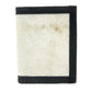 White canvas wallet with black trim edges in Coyote Combat Leather for stylish durability