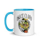 White ceramic Black Cloud mug with blue handle and cartoon monster design