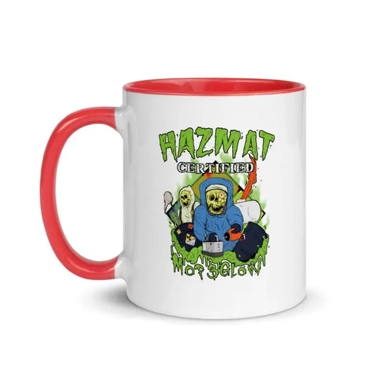 White hazmat mug with red handle and rim featuring a cartoon design and color inside