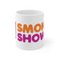 White ceramic Smoke Showin Mug featuring SMOK SHOM text in orange and pink letters