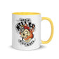 White ceramic apparel mug with yellow handle, skull design, and Chief Killer Apparel text