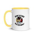 White coffee mug with yellow handle asking if tattoos matter, perfect for a tea ritual