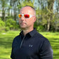 White-framed METEL M30 Safety Sunglasses with orange-tinted reflective lenses