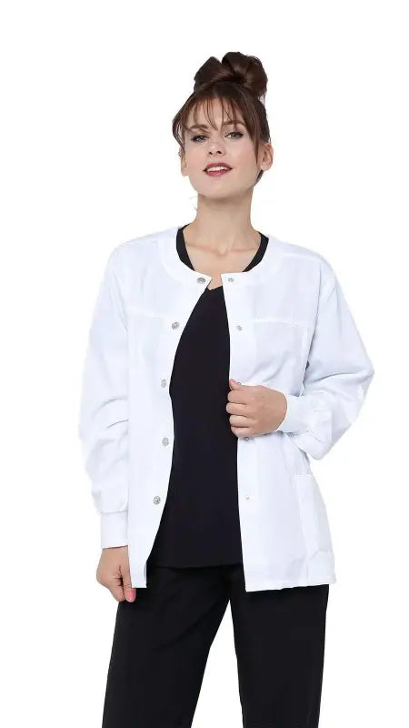 White women’s snap jacket warm up uniform scrub with ribbed sleeves and snap-front closure