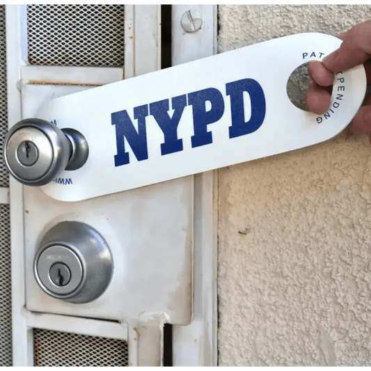 White NYPD skateboard deck for NYPD DoorJamm, honoring first responders and service