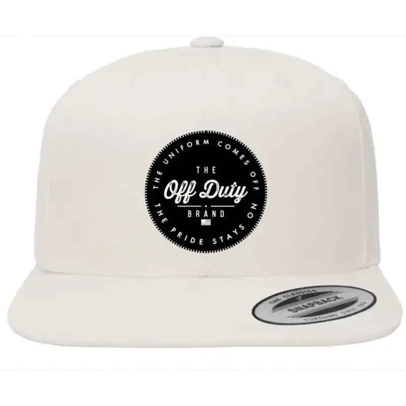 White snapback cap with black circular Off Duty logo for the brand’s essential snapback