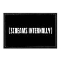 White text screams internally on black background of removable patch for quick style