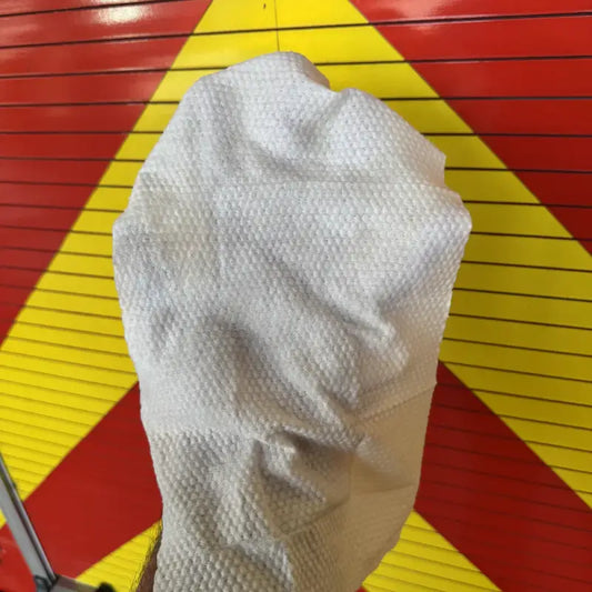 White textured cloth from Fire Wipes designed for biodegradable industrial strength disposable use on external dermal areas