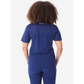 Back view of navy blue women’s four-pocket scrub uniform with visible curly hair