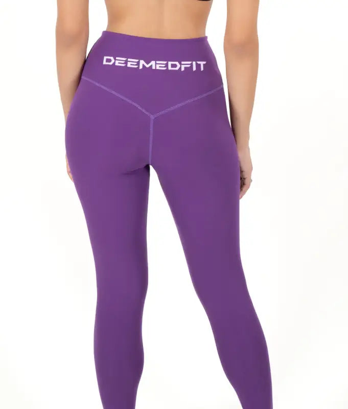 Purple athletic leggings with DEEMEDFIT waistband, perfect women’s top-tier leggings