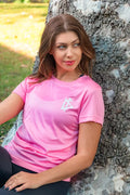 Pink Women’s Training Tee with small white logo on chest for enhanced resilience
